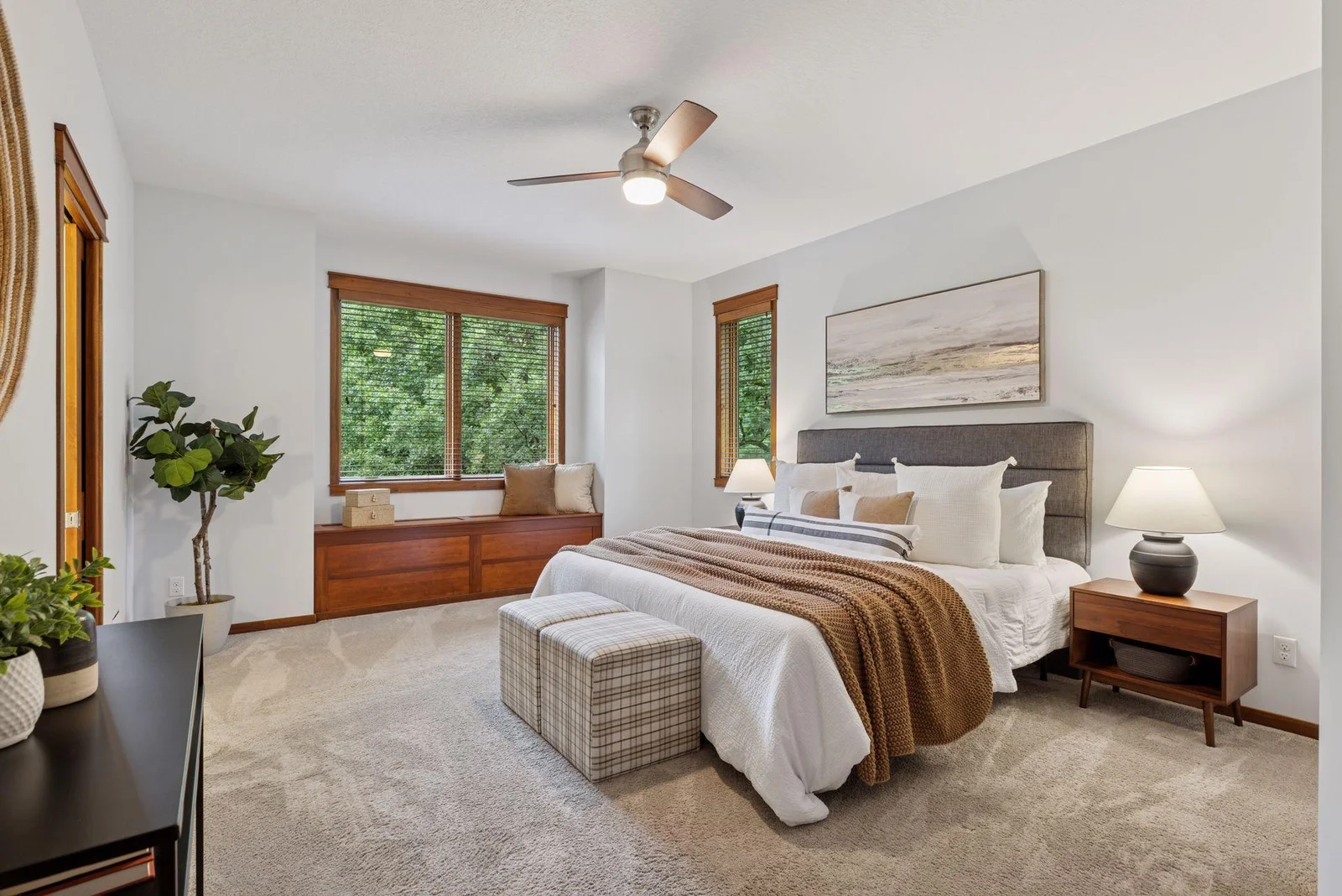 The primary bedroom is a calming retreat—spacious, quiet, and full of light.
