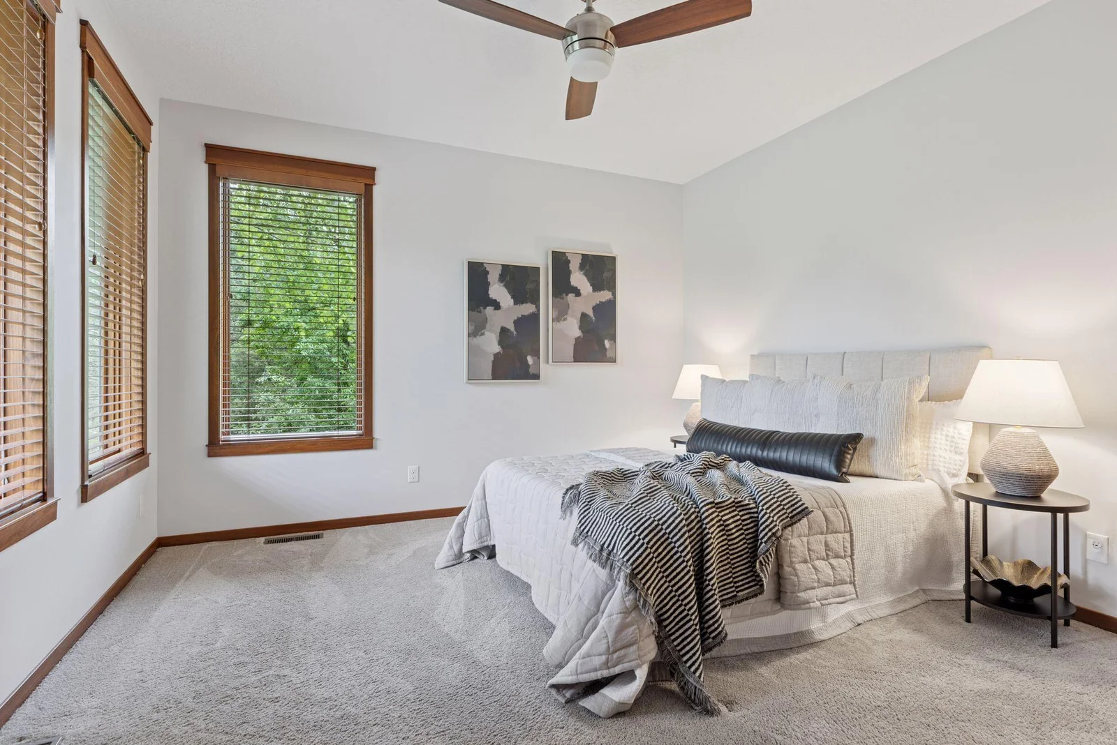 Another view of the second bedroom—large windows and plenty of natural light.