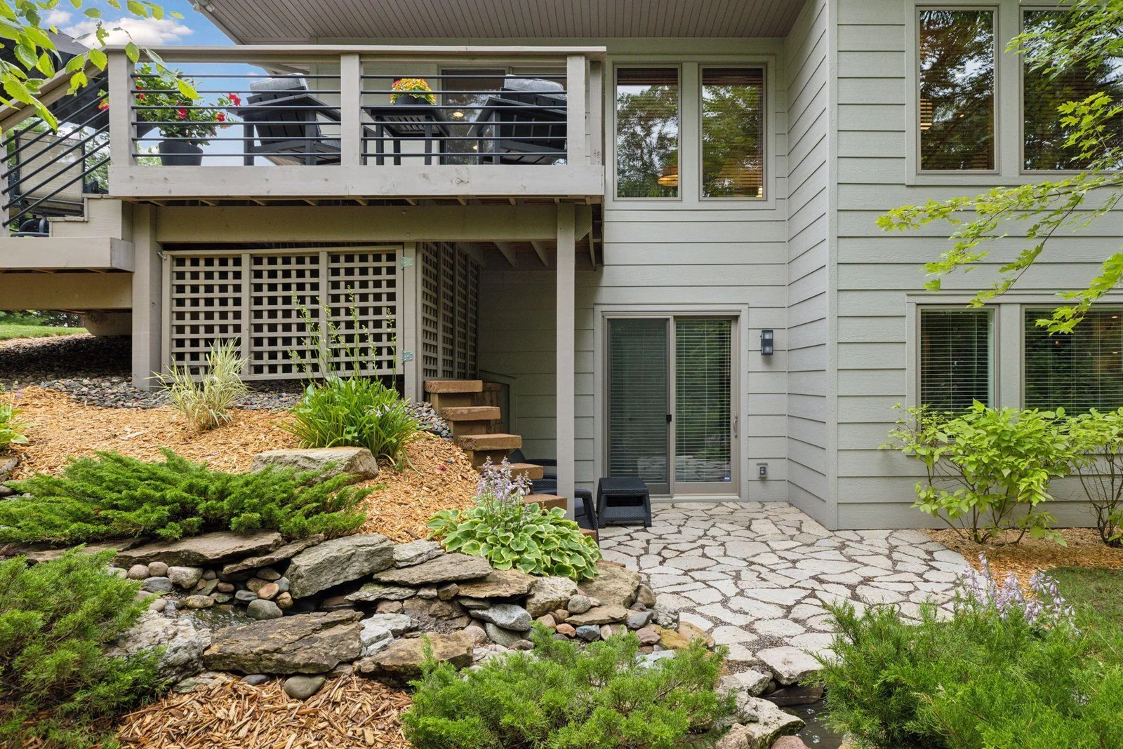 Another look at the beautifully landscaped backyard—low maintenance, high impact, and truly tranquil.