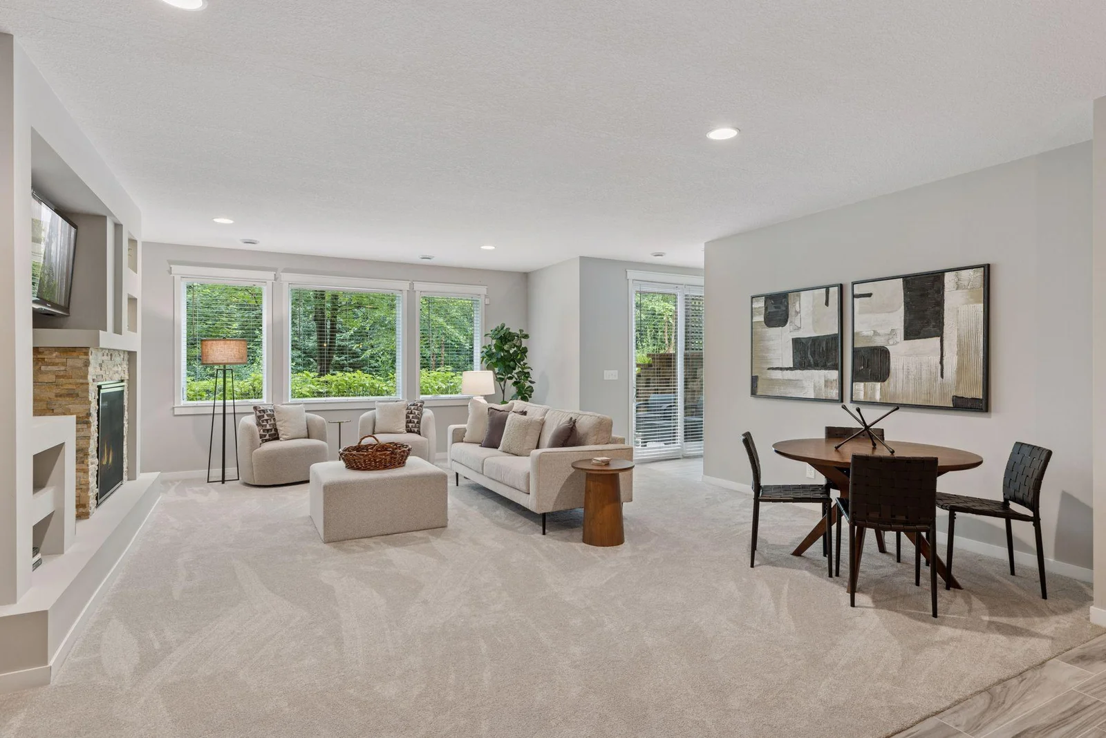 Walk out to the beautifully landscaped patio, with windows flooding the space with natural light.