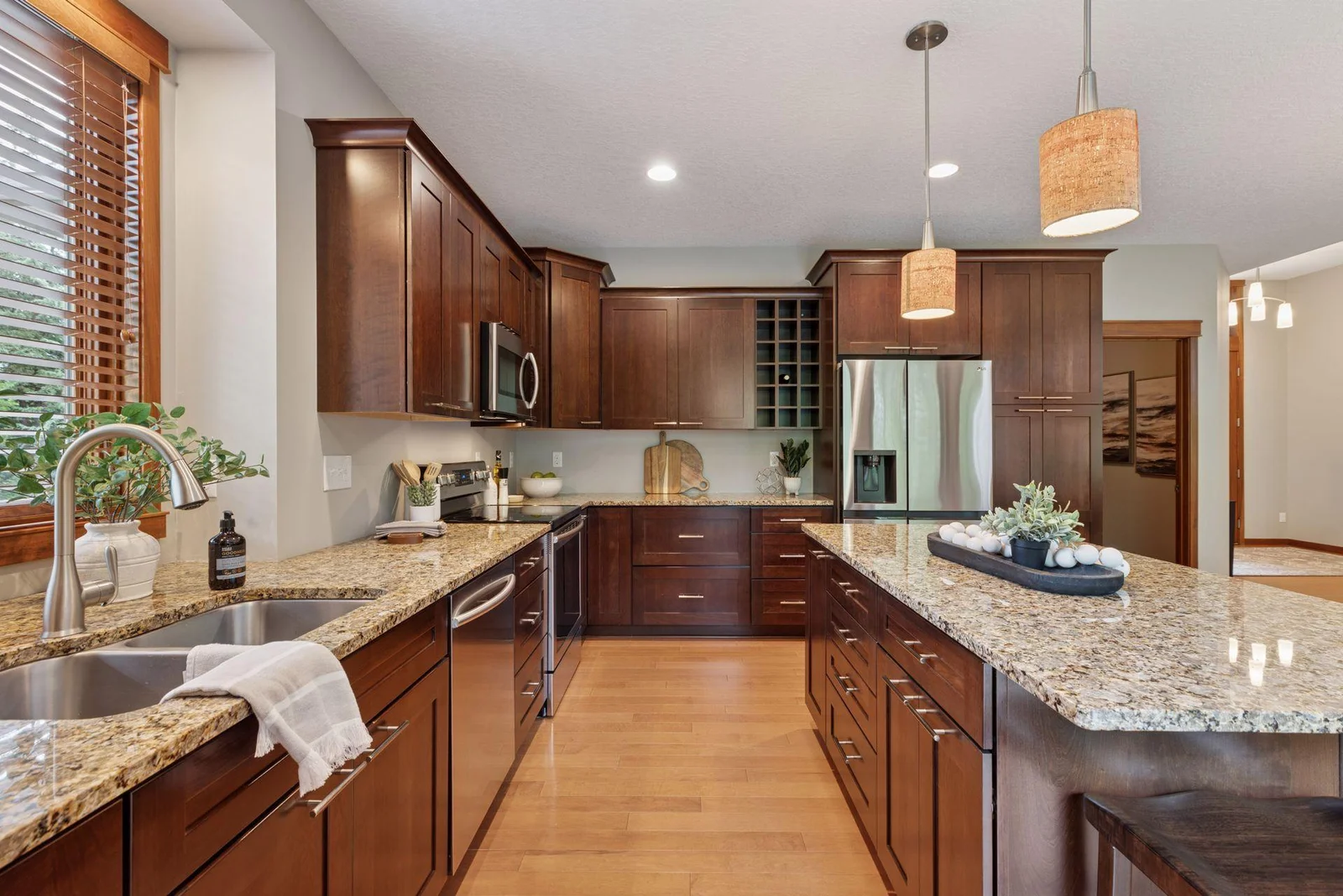 Custom cabinetry adds beauty and functionality to this well-designed kitchen.
