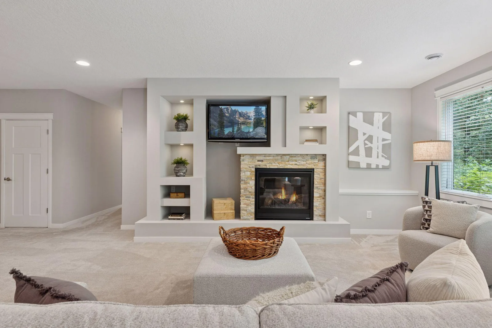 Whether hosting friends or enjoying a quiet night in, this space delivers flexibility and charm.