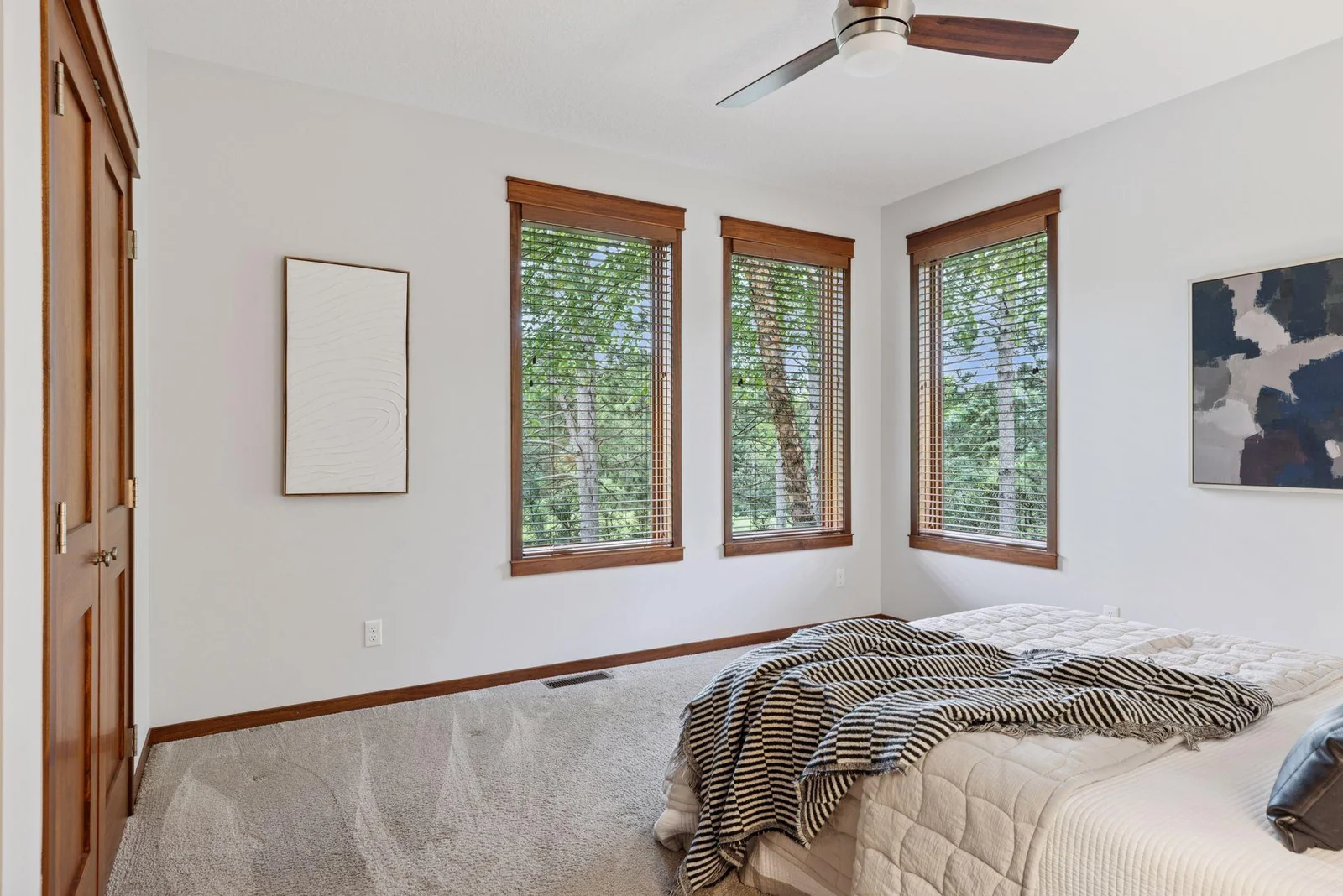 Bedroom #2 on the main level is bright, spacious, and perfect for guests.