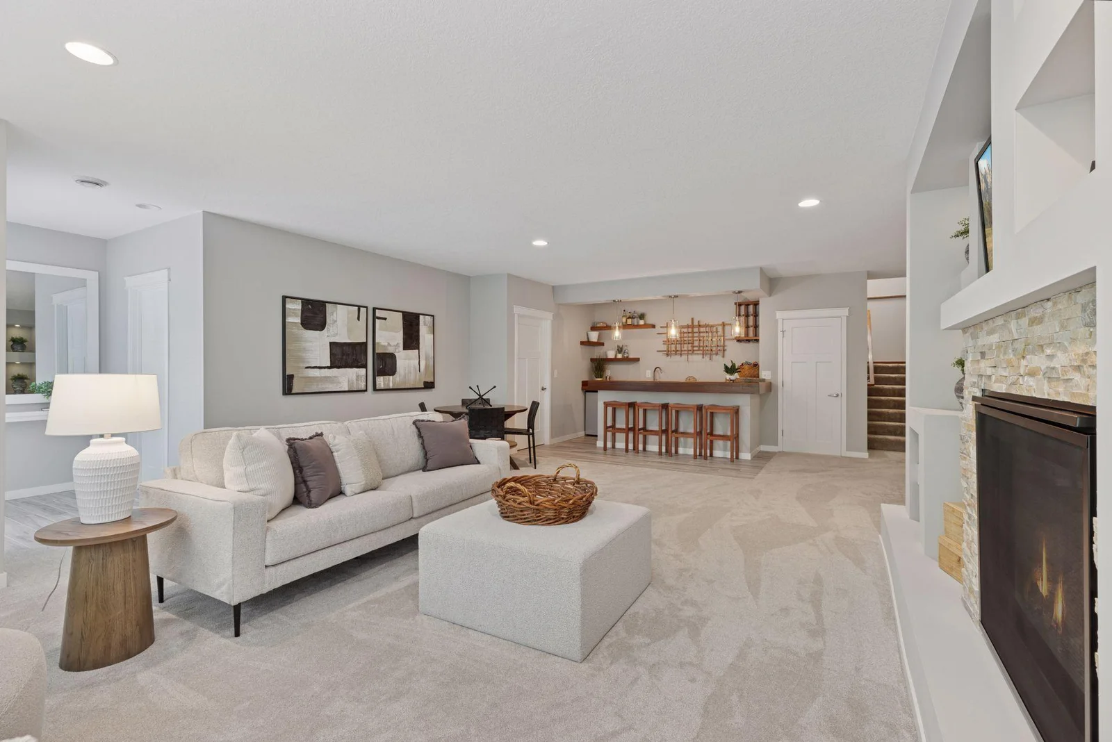 The lower level includes a spacious storage area and workshop—ideal for hobbies or expansion.