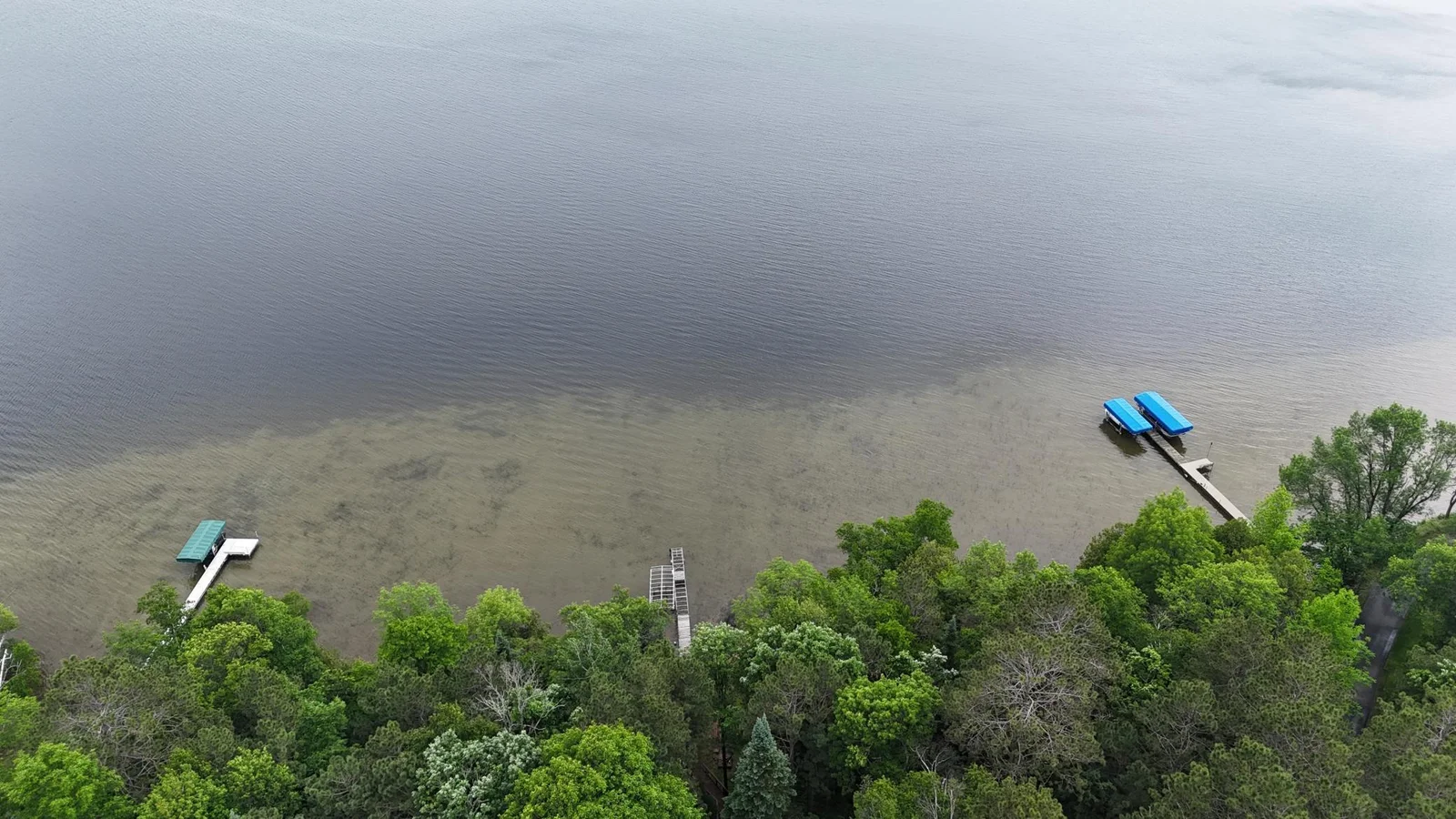 150' of sandy shoreline with a flat 45' deep landing area