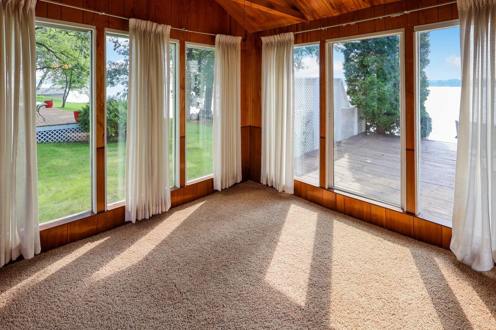 Lakeside cabin #1- tons of natural light in the sunroom!.jpg