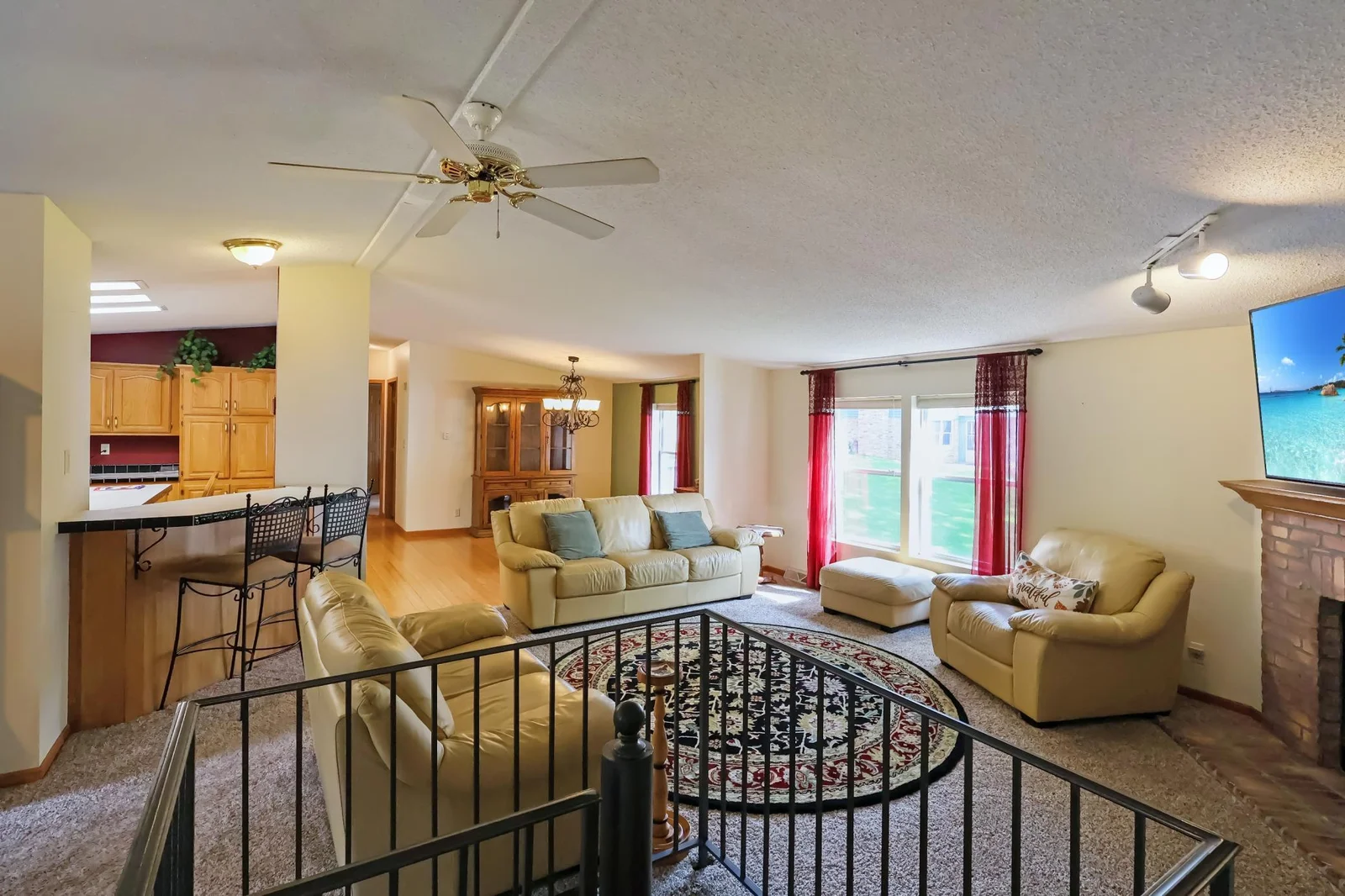 Main house- living room opens to the kitchen and dining..jpg