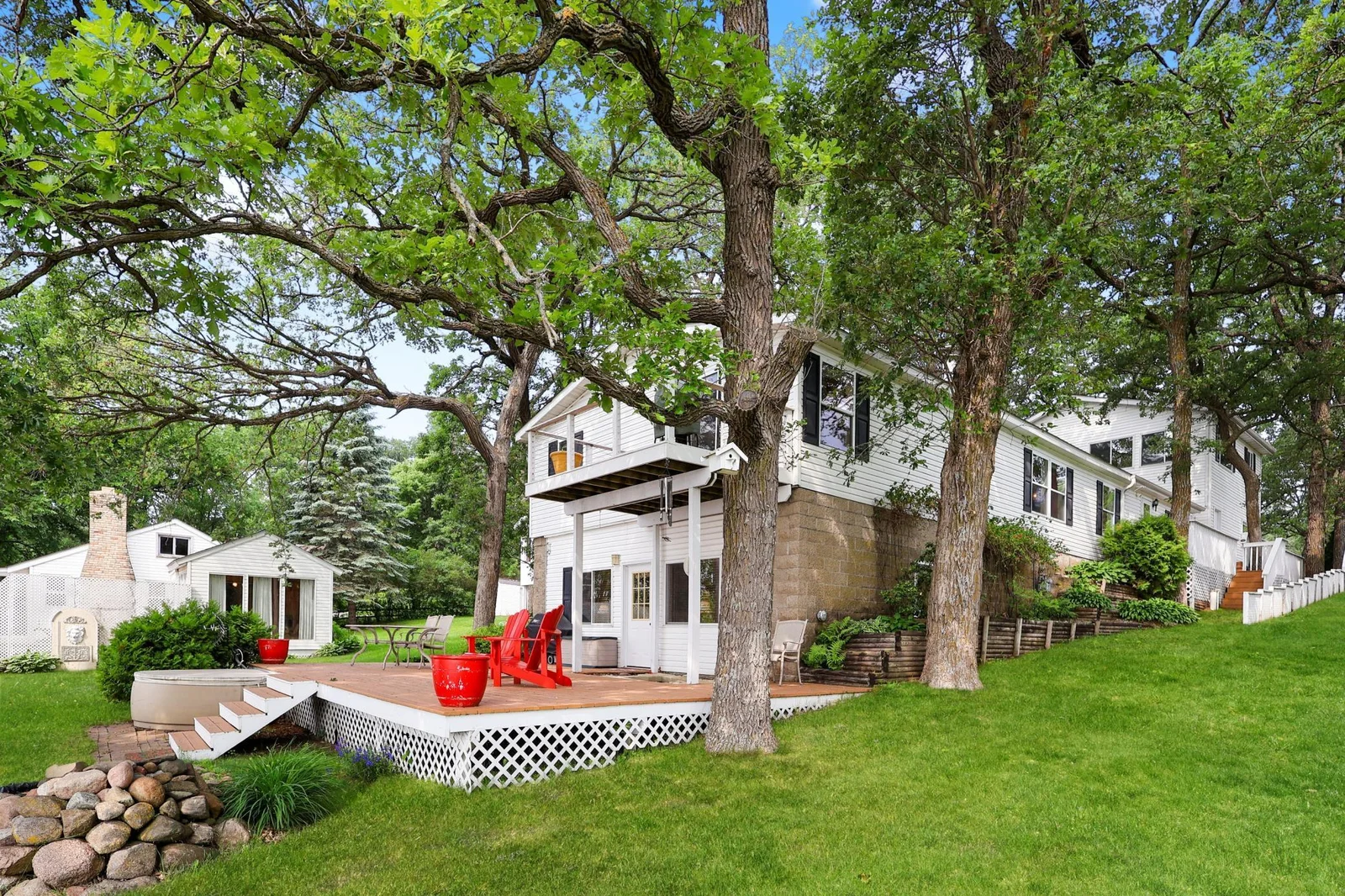 Main house- huge patio area off the lower level family room. Great lake views!.jpg