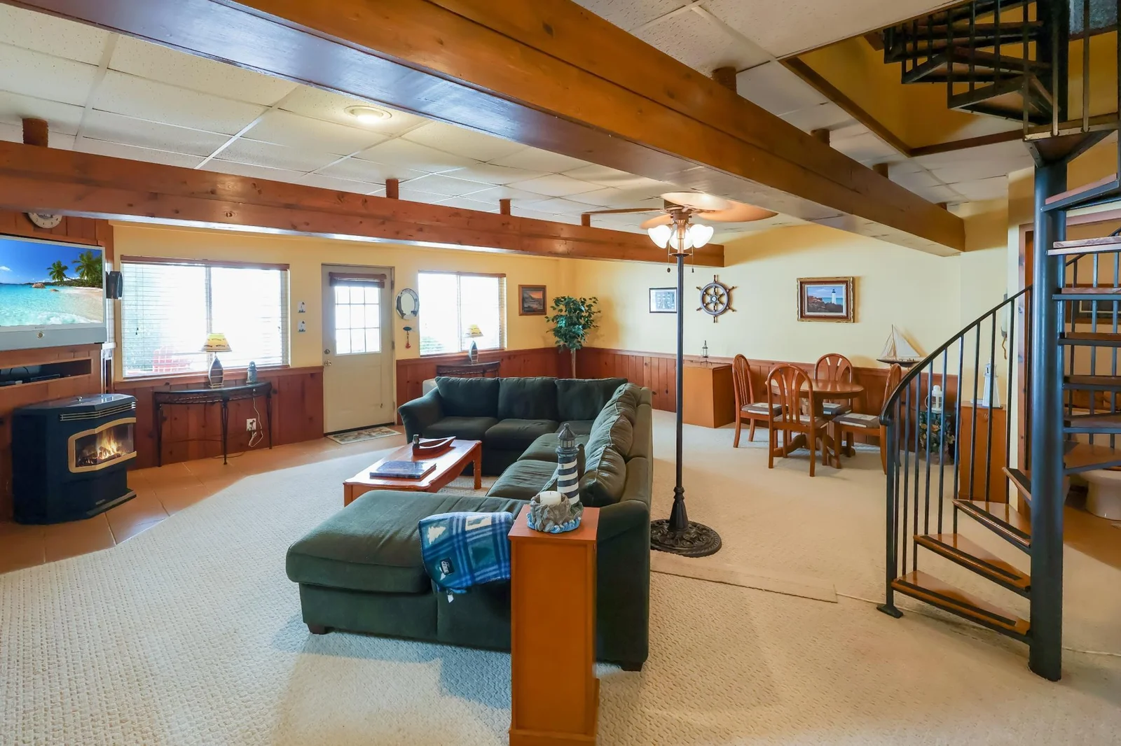 Main house- lower level family room that walks out to the backyard..jpg