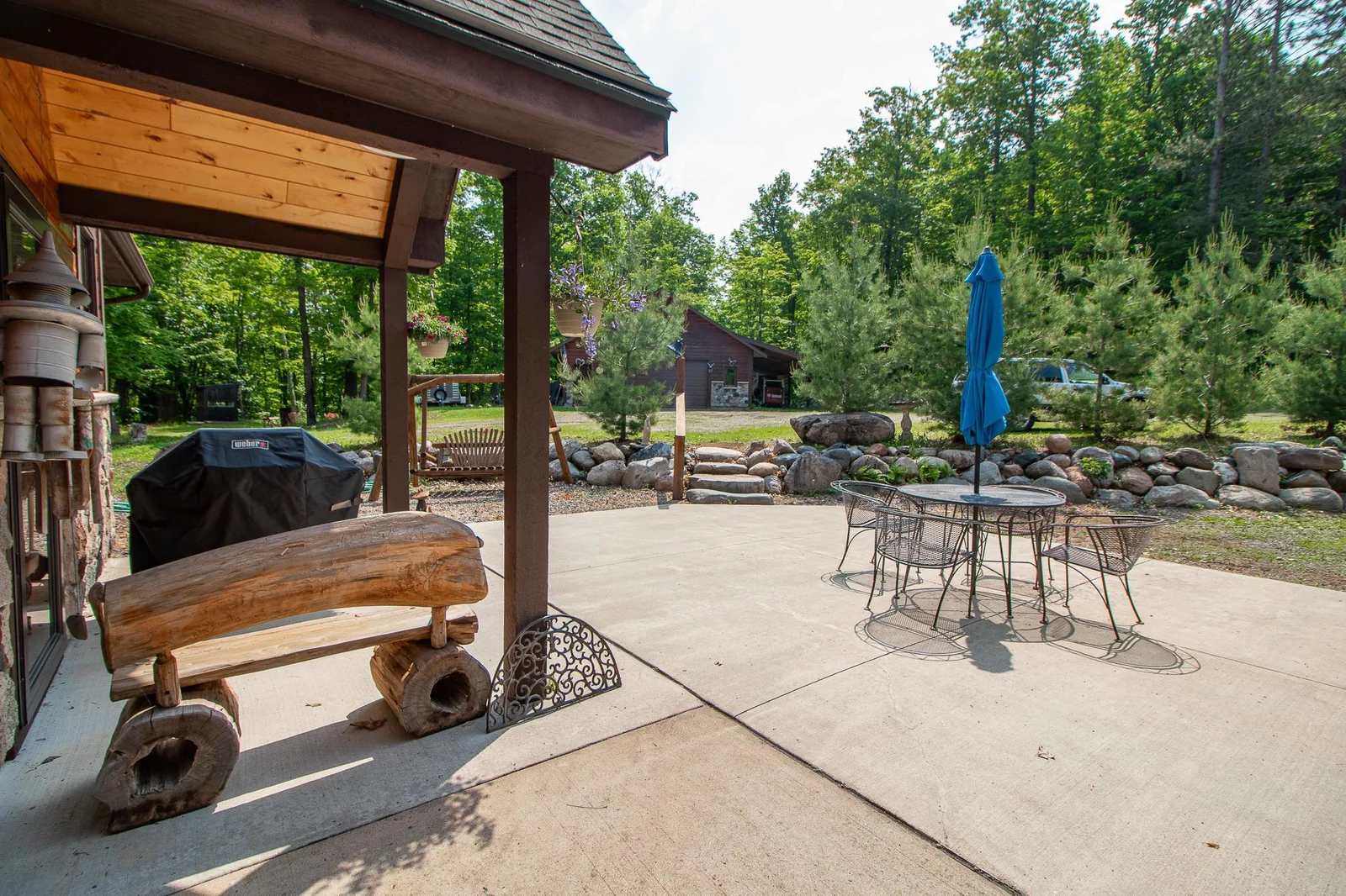 Patio - detached garage in background