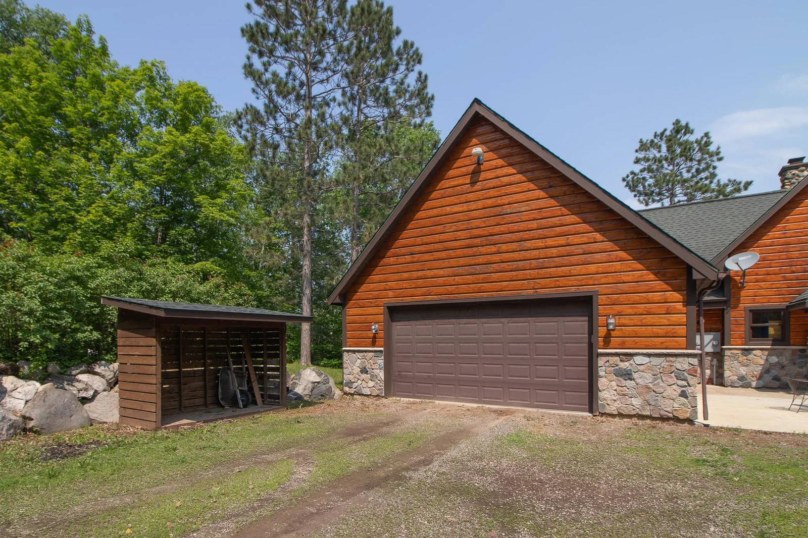 Attached garage 28x36 - wood shed to left