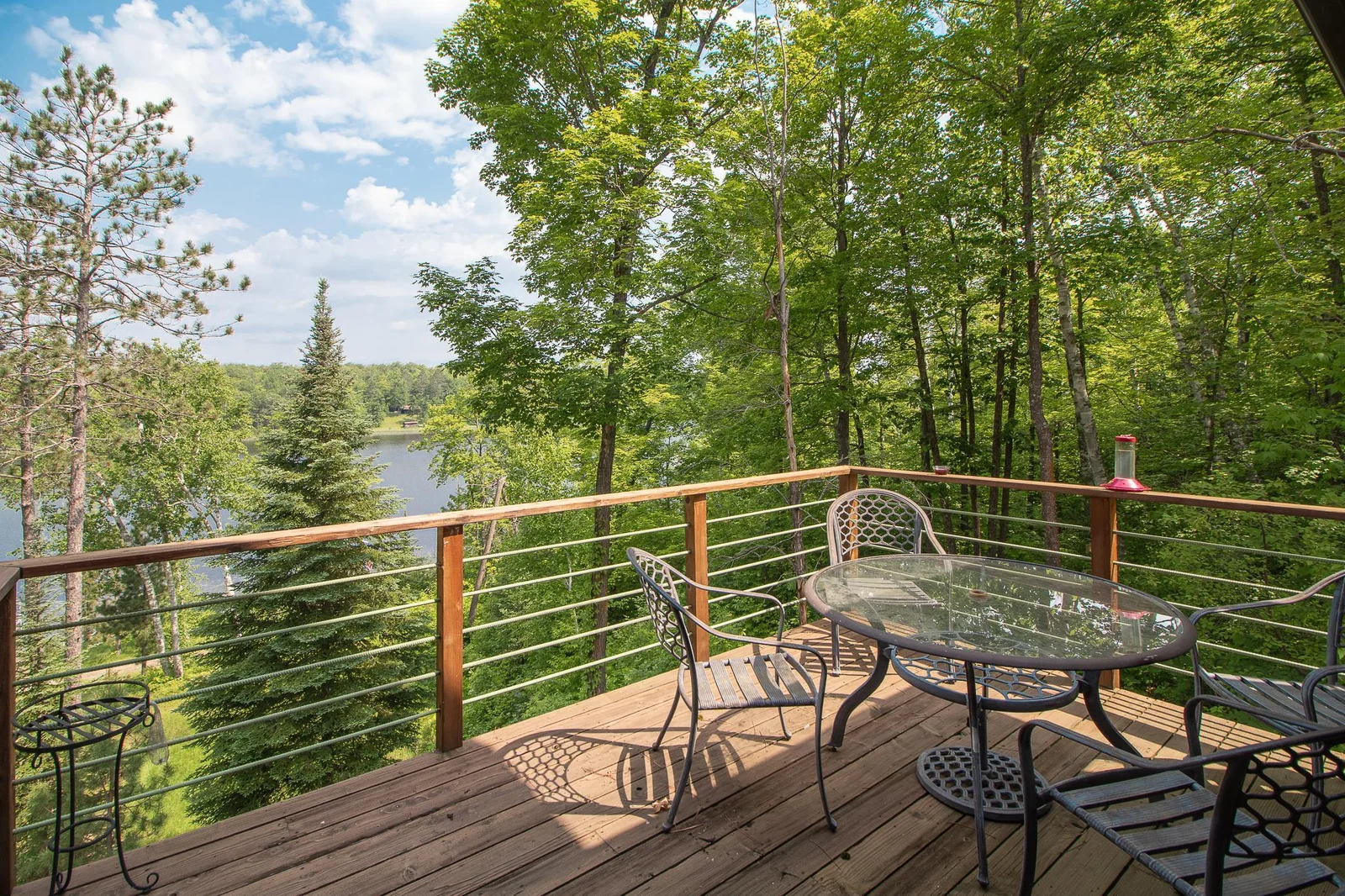 Lakeside deck off primary bedroom
