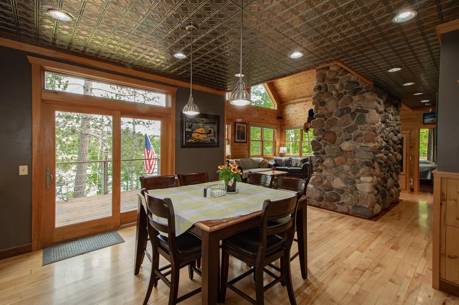 Dining/Kitchen with sliding doors to lakeside deck