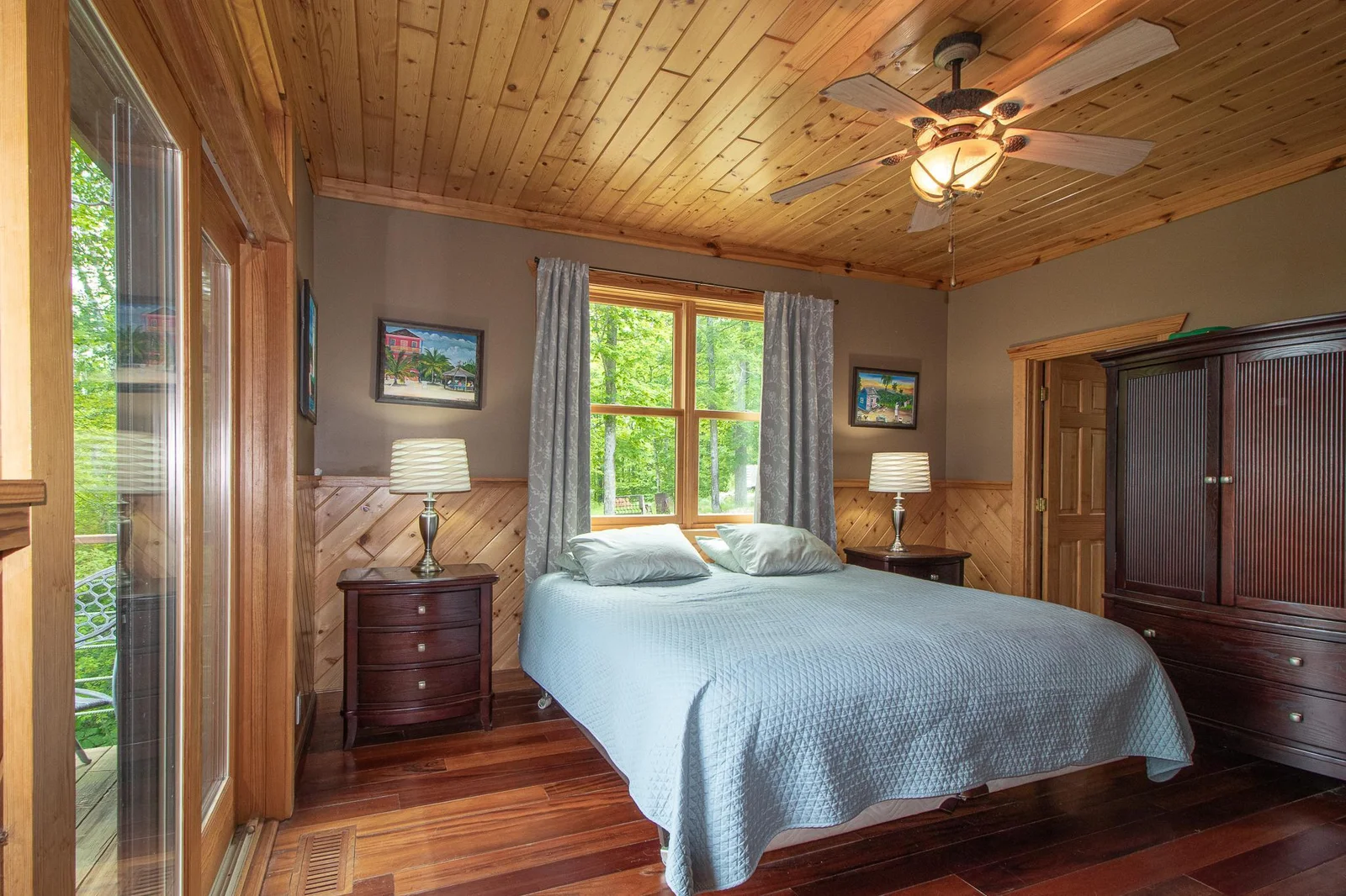 Primary Bedroom with lakeside deck