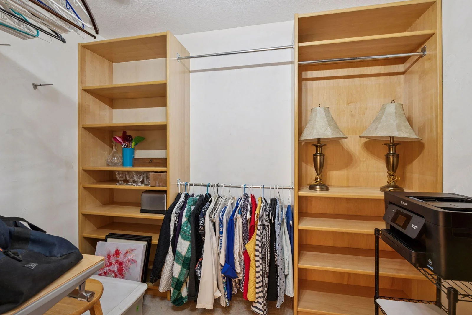 Walk in closet in primary bedroom