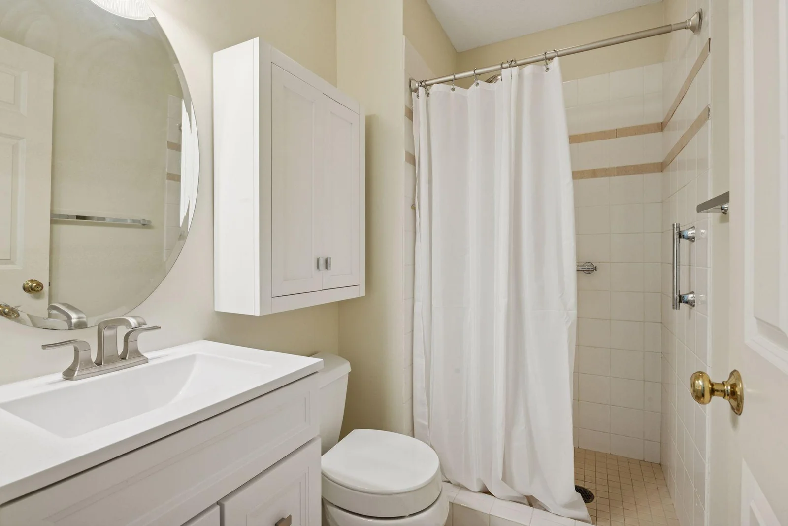 Bathroom off the second bedroom with walk-in shower