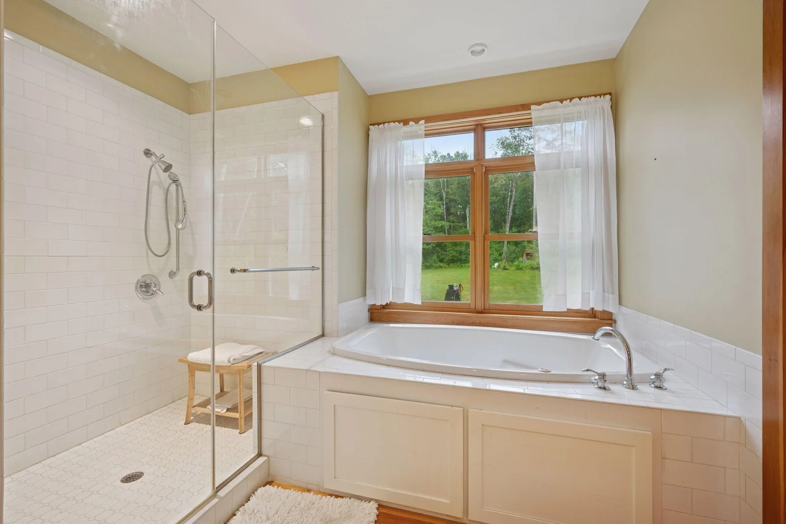 Enjoy a warm bath with back-yard views!