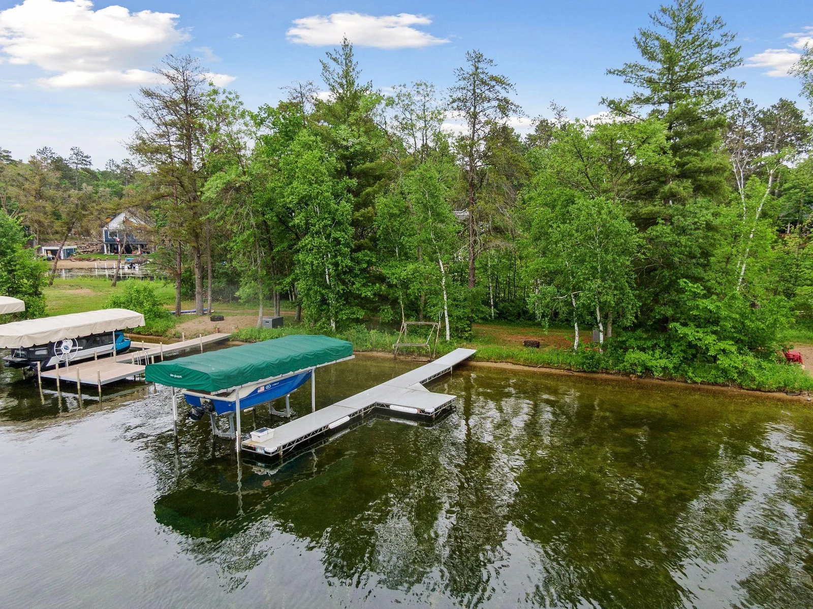 Boat, lift and dock to remain!
