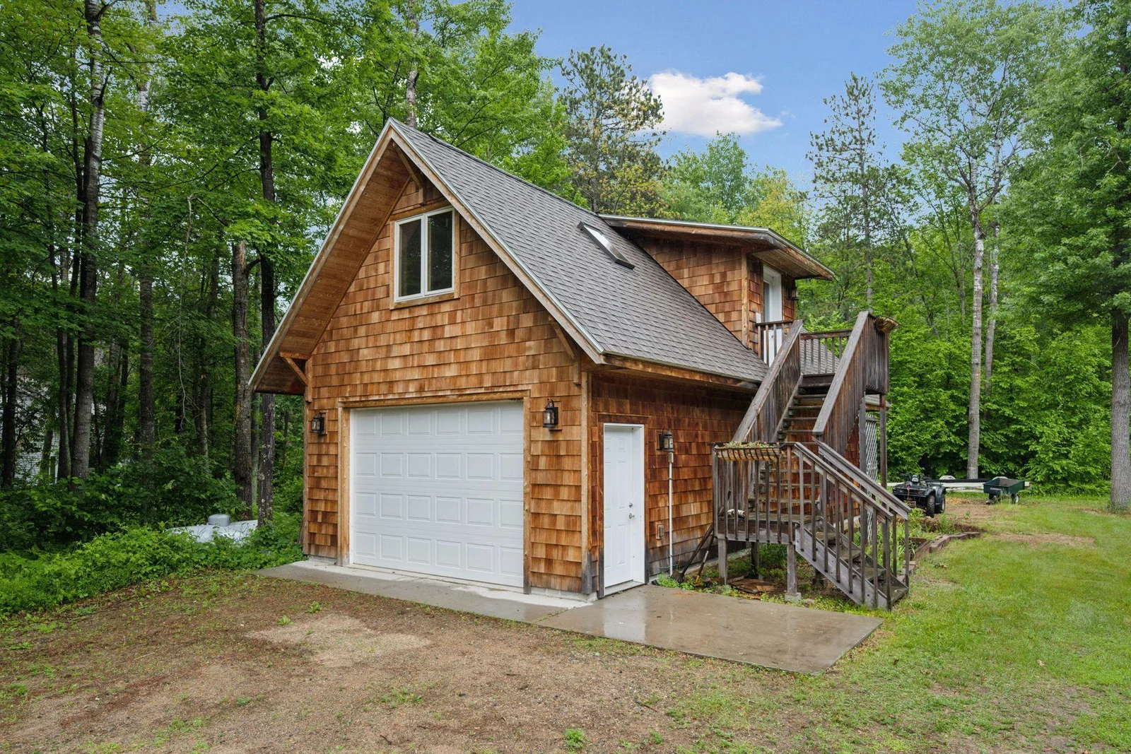 Extra garage / Boat house with upper-level guest room