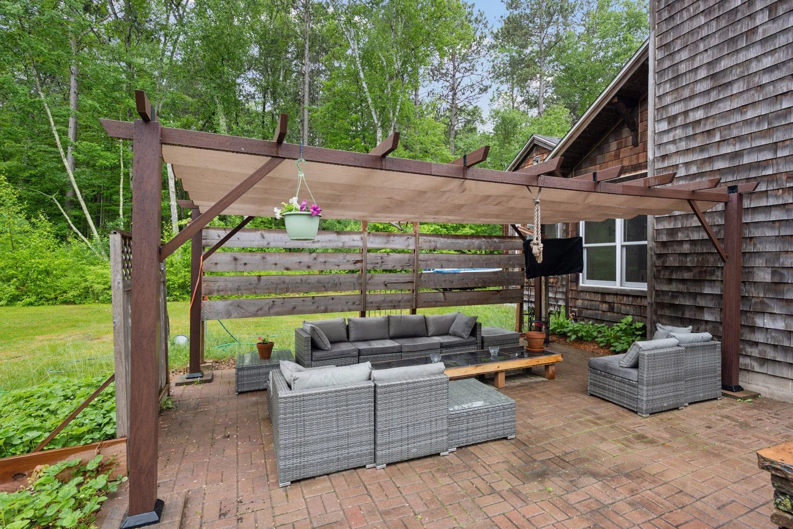 Beautiful pergola space on paver patio