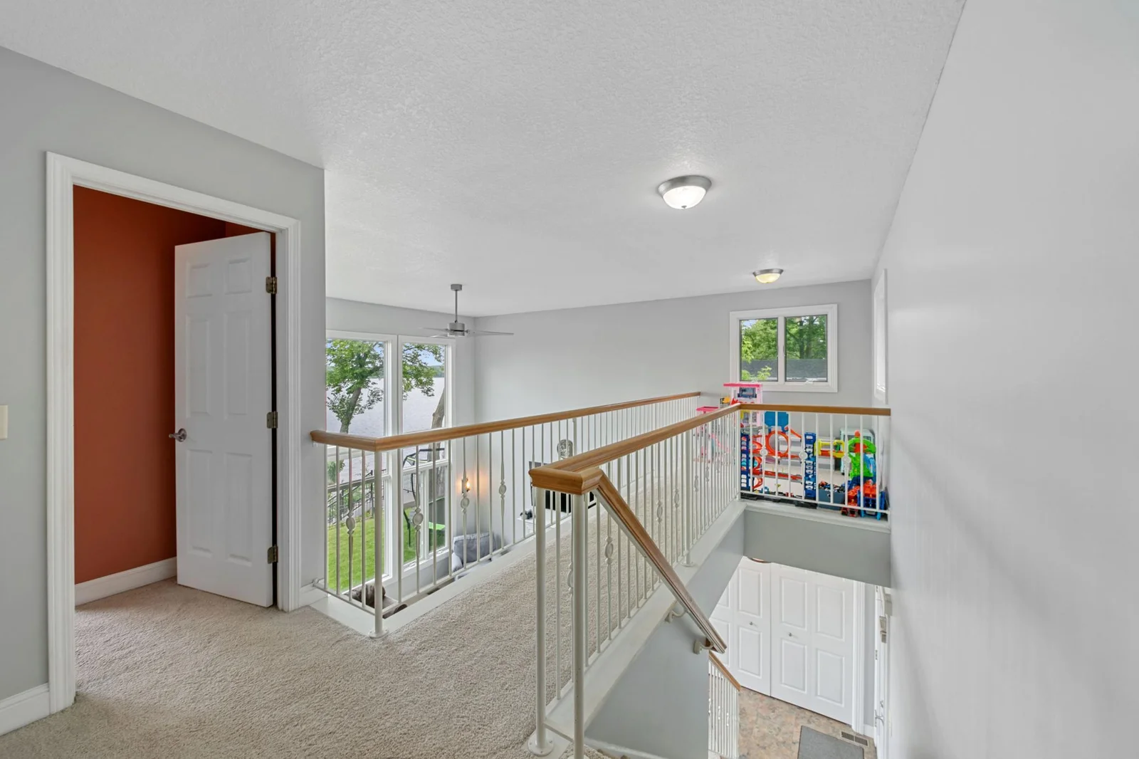 Lofted hallway to overlook lake or great work from home space or pile up the toys