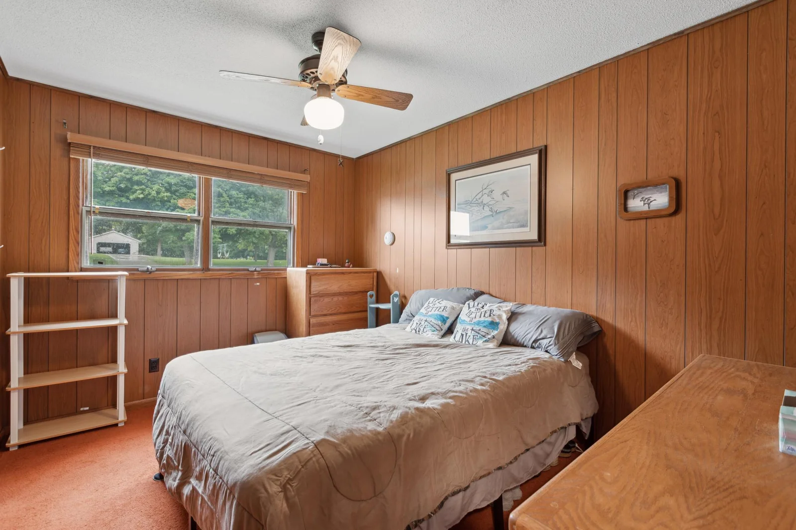 View of the second bedroom. You don't want to miss this opportunity to get on Lake John with all the bustling new construction activity and many improvements happening in the area!