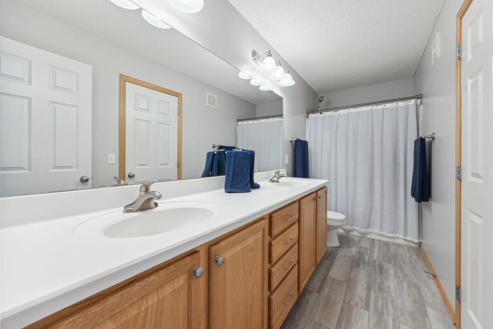 Upper level shared bath and convenient dual sinks.