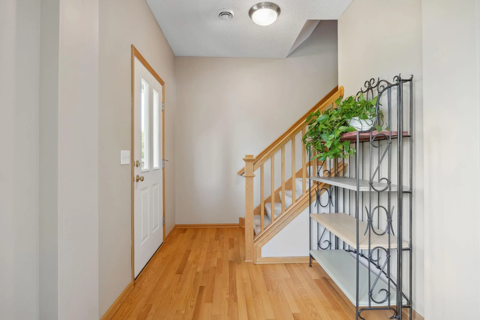 Secondary entrance to home, off of walking path. Up the stairs to loft, bedrooms and laundry.