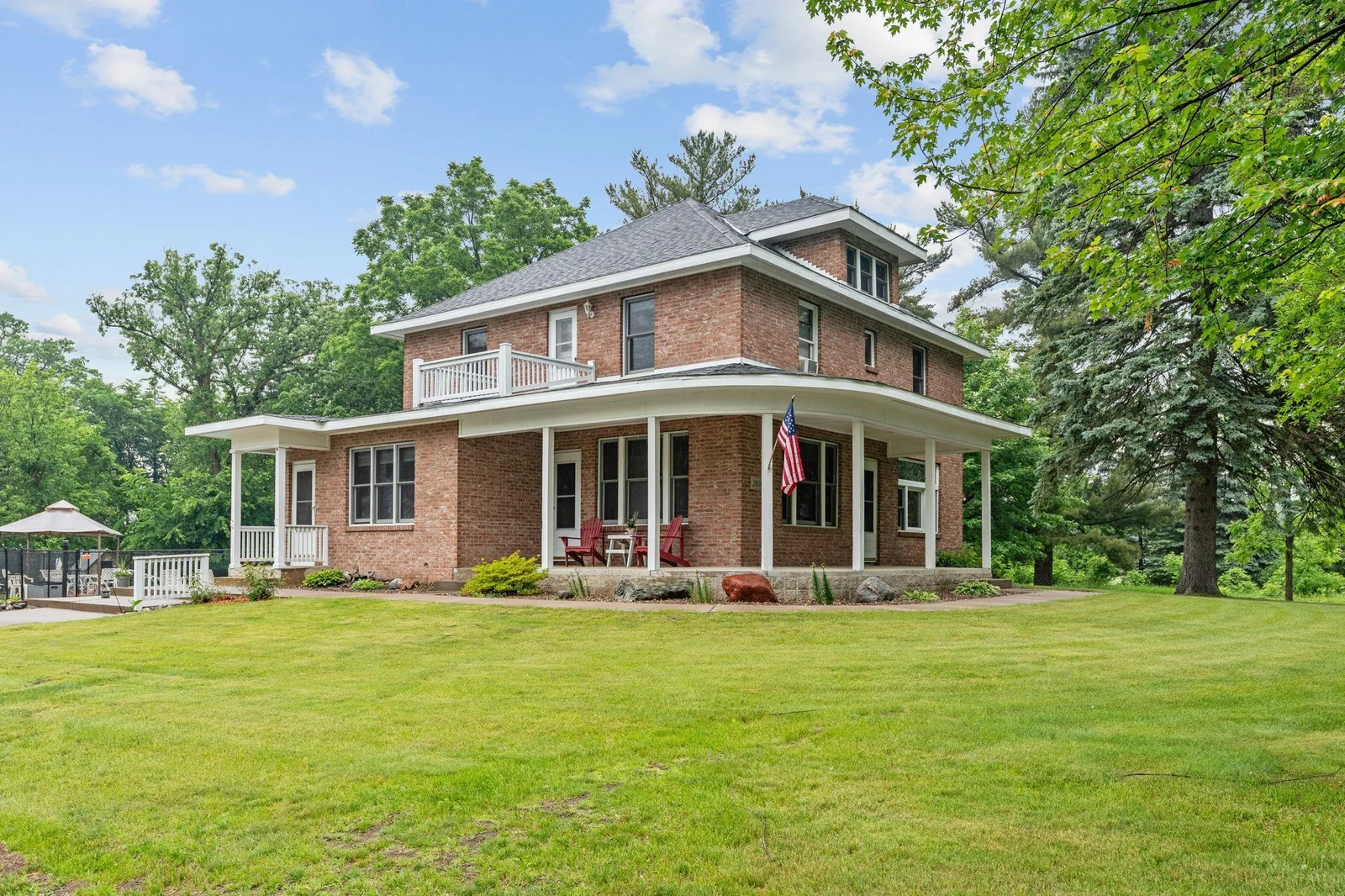 Wrap-around porch-perfect place to relax on a warm summer day!