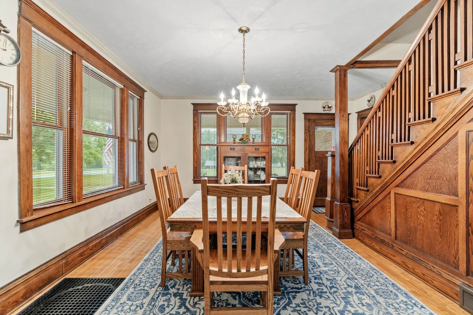 Dining room features original woodwork detail.