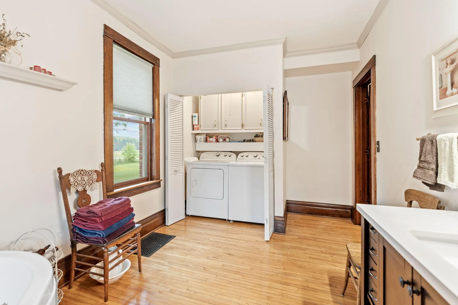 Main level Bathroom-features a laundry closet.