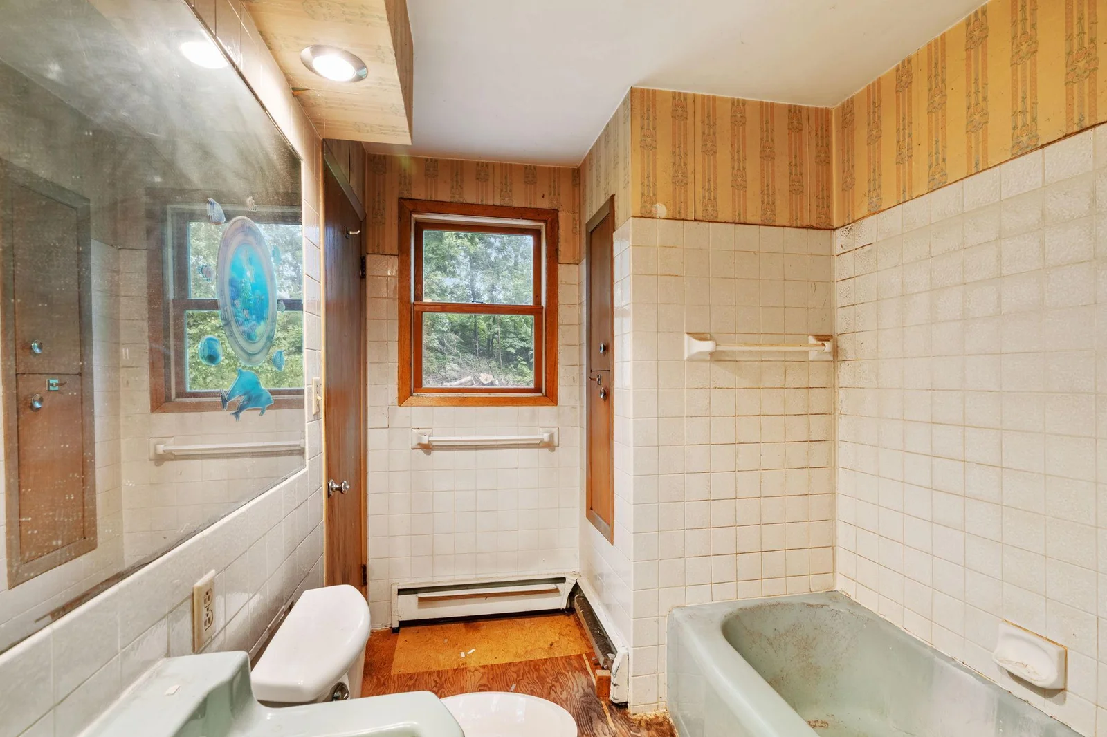 walk through main floor bath has access from the backdoor and the bedroom hall