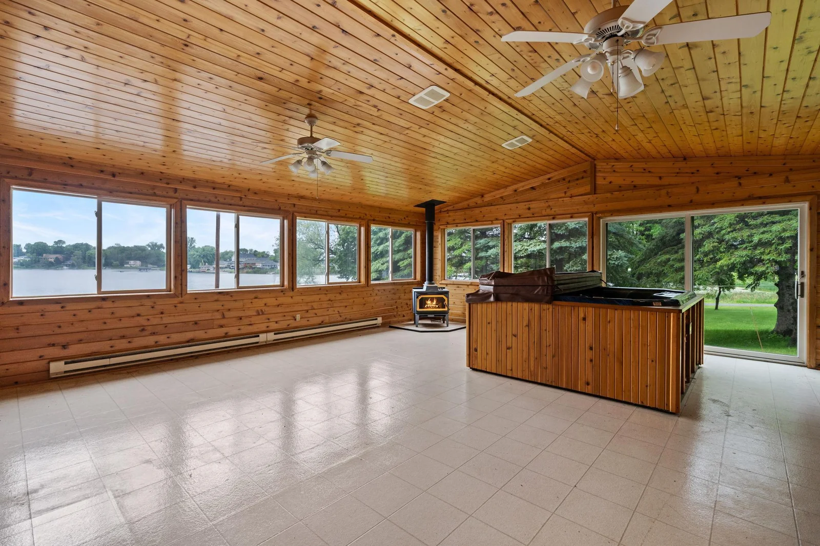 Large sunroom above the garages overlooks the lake
