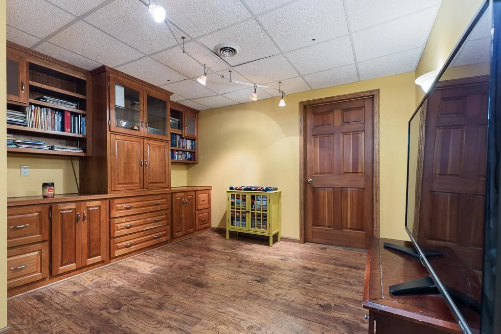 Lower level bonus room with a large storage closet. Would make a great reading room, movie room, or entertainment space!