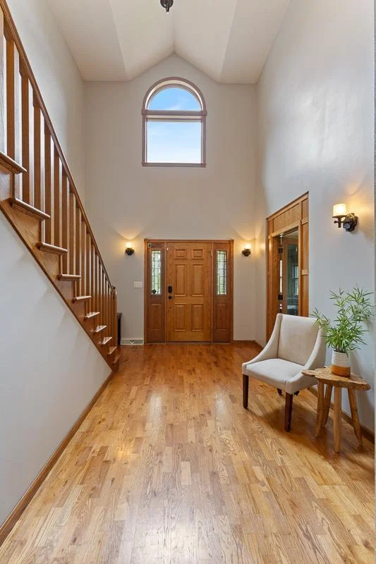 Stunning front entry features vaulted ceilings and a grand front entry.