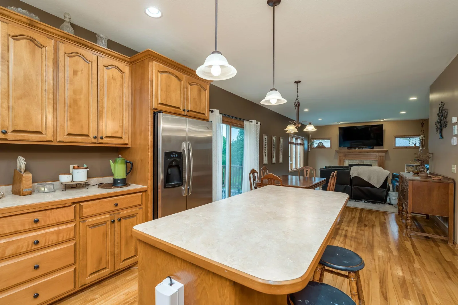 Lots of room on the center island to cook at or eat at + nice open layout.