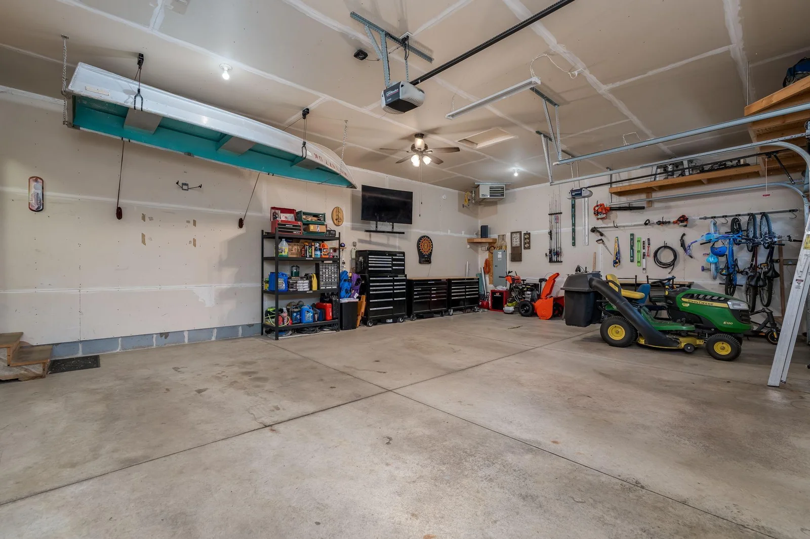 Plenty of room for vehicles and toys in that heated garage!