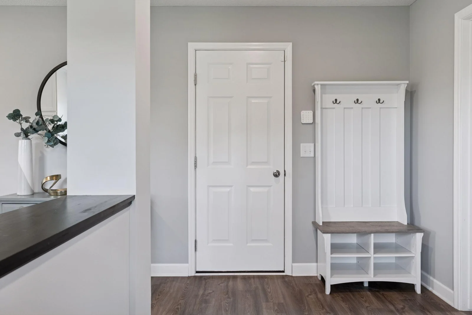 Door to the garage is conveniently located right near the front foyer area of the home