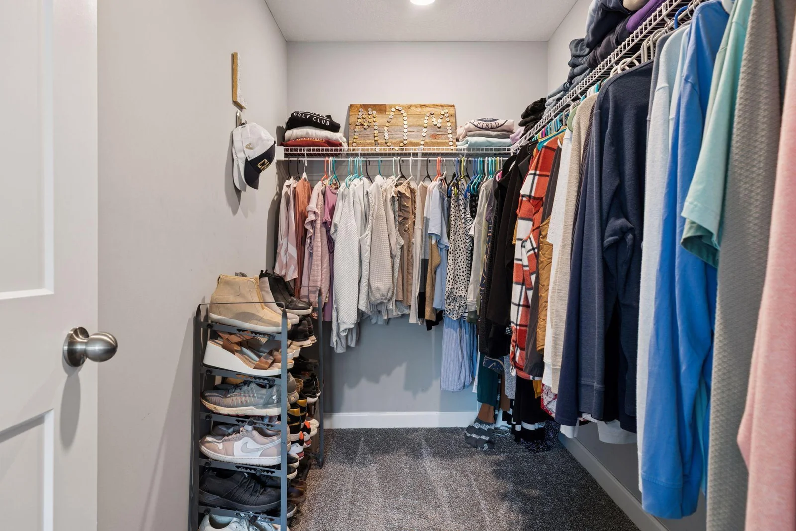 Primary bedroom walk-in closet