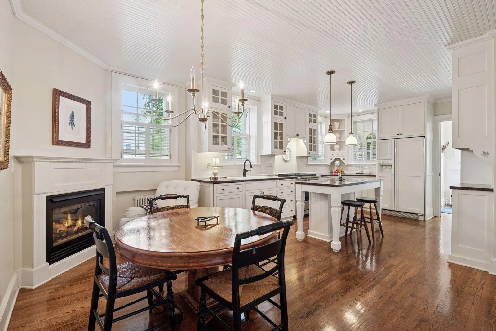 The heart of the home with a cozy gas fireplace.
