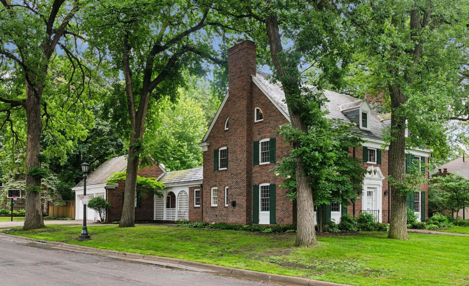 This stately colonel sits proudly on a corner lot in the coveted Kings Maplewood neighborhood.