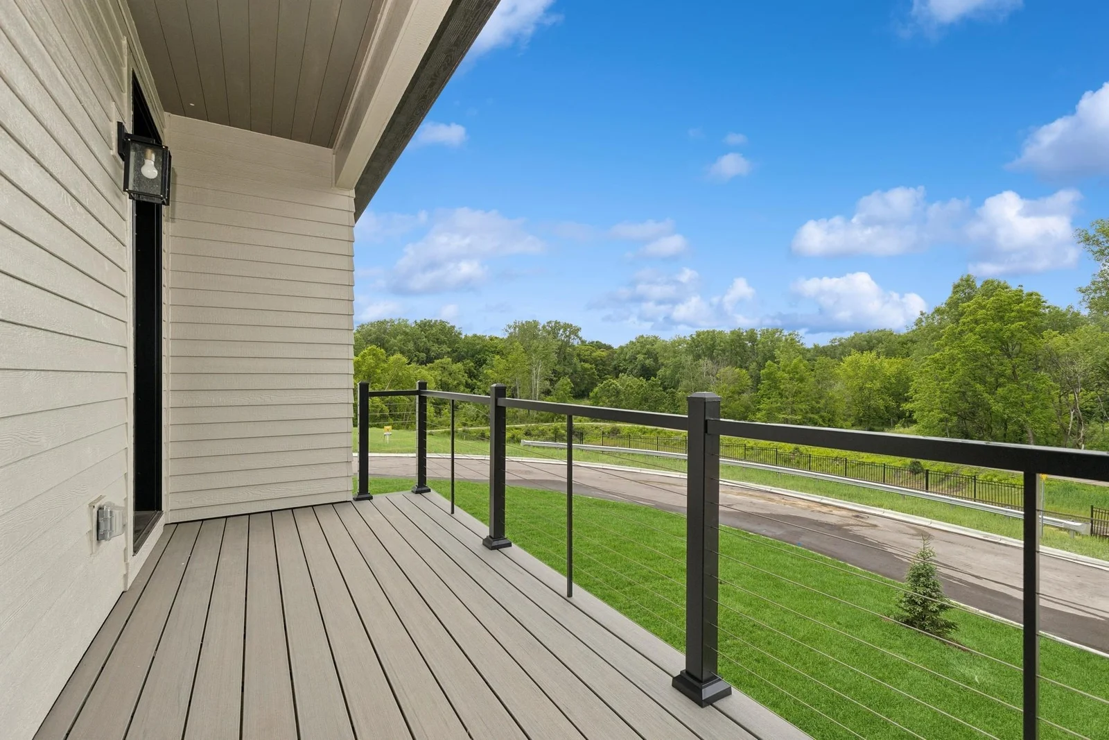 Maintenance free decking with wire railings.