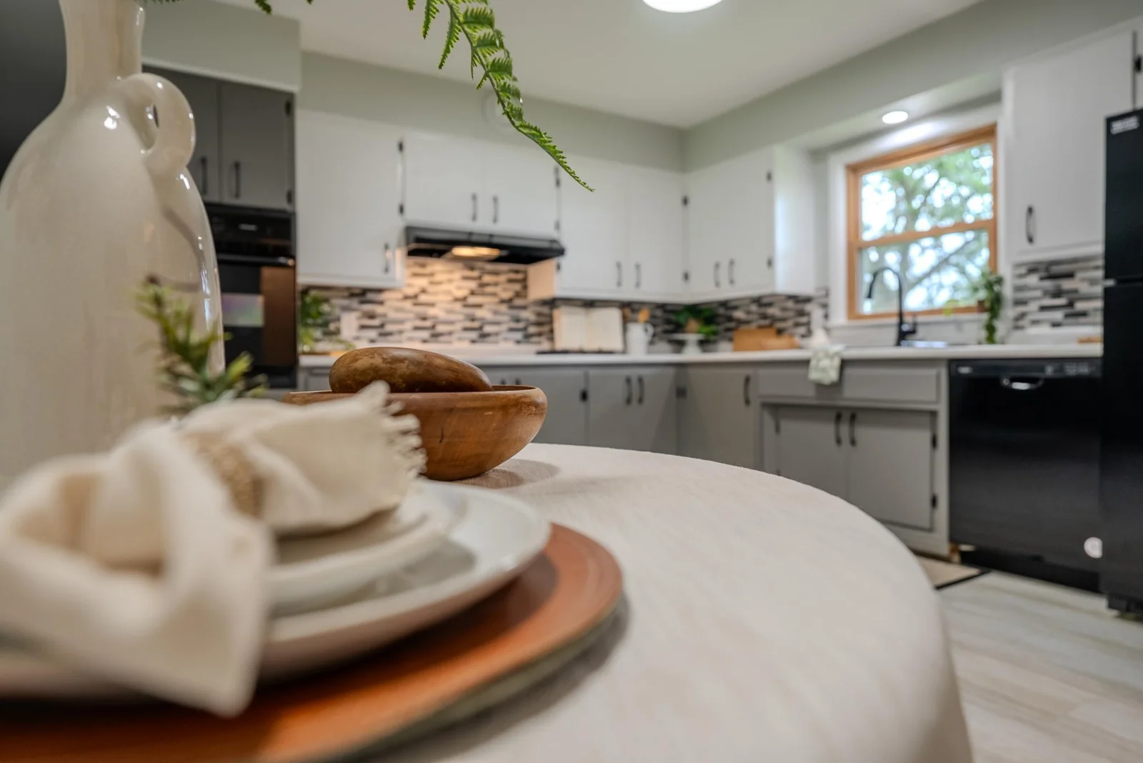 Dining and kitchen staged.jpg