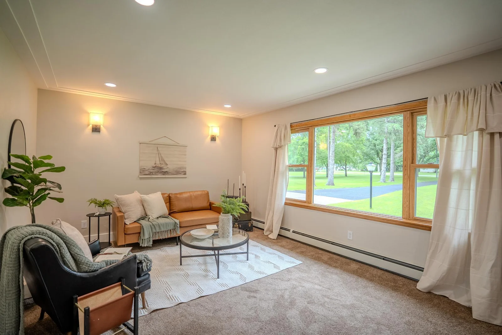 Living room is spacious with huge picture window.jpg