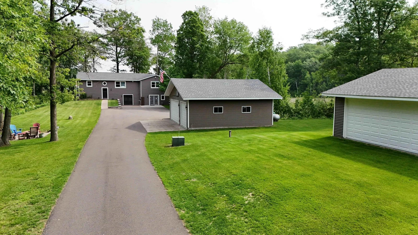 Amazing privacy, tons of storage, and 33+ acres to enjoy overlooking Pine Lake!