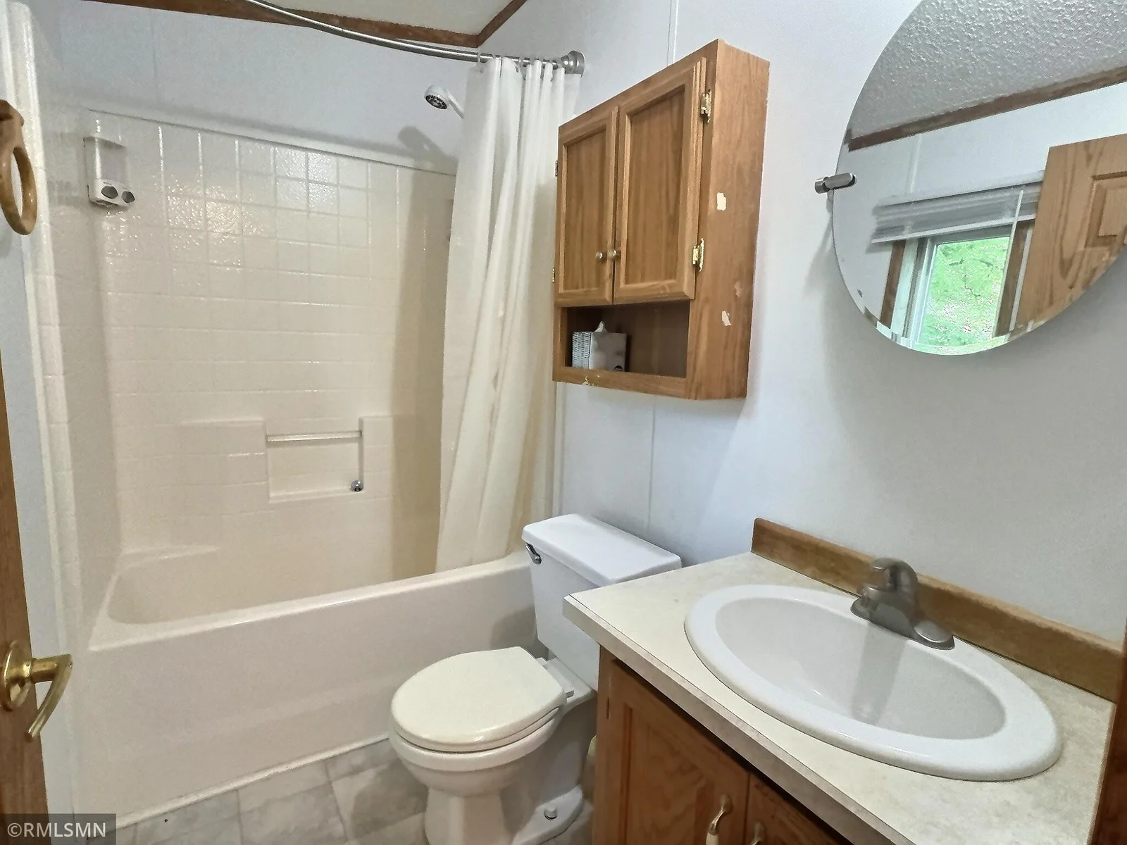The main full bath is located just off the kitchen and the 3rd bedroom.