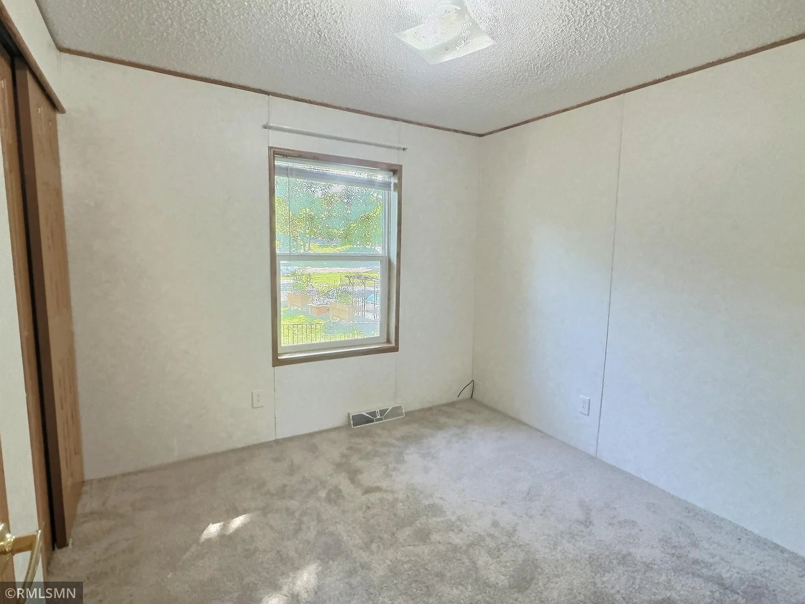 Here is bedroom 2 located towards the back of the home.
