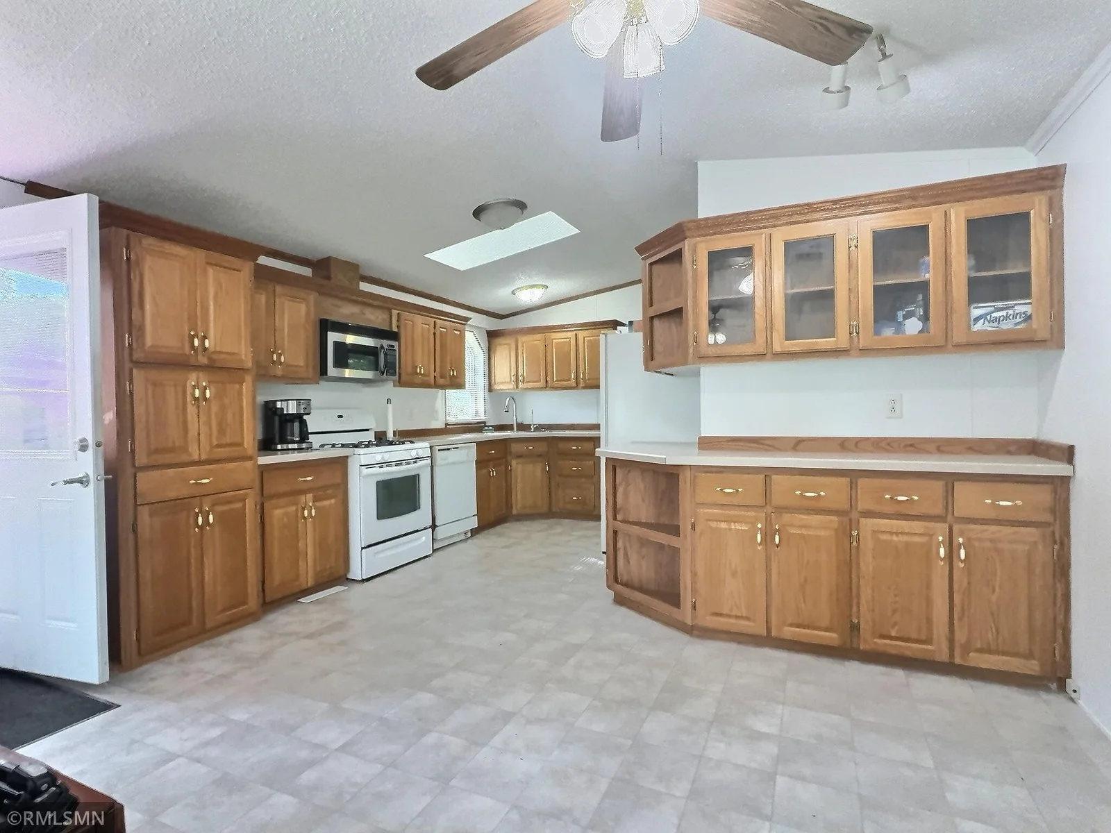 Ample cabinet space in the kitchen and dining room area off the home.