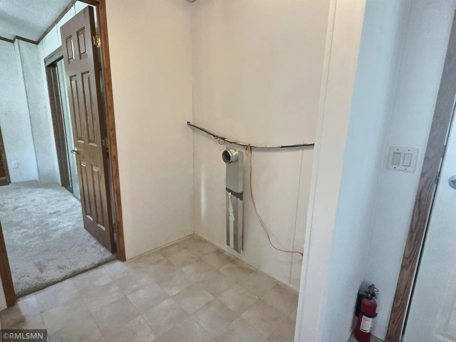 Laundry area is conveniently located outside the primary and 2nd bedroom.