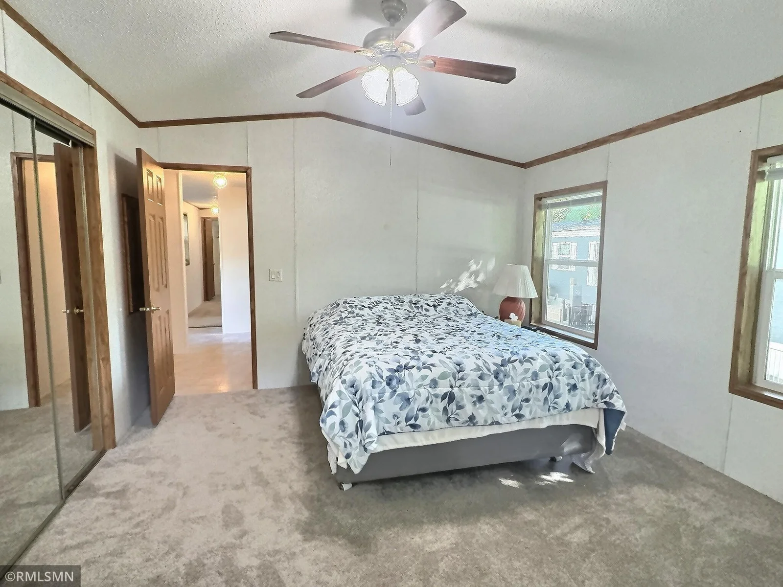 The private primary suite includes a whirlpool tub and separate shower, giving you a true retreat feel.